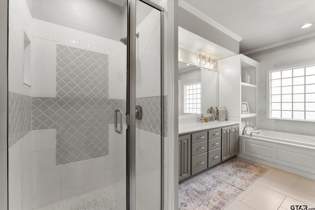 bathroom featuring separate shower and tub, vanity, tile patterned flooring, and crown molding