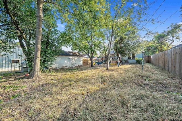 view of yard featuring a playground