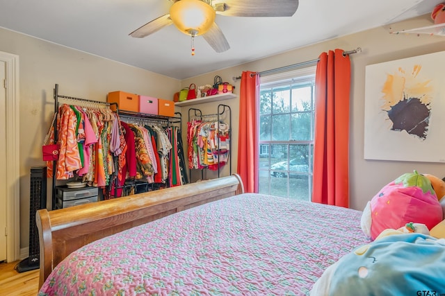 bedroom featuring ceiling fan and wood-type flooring