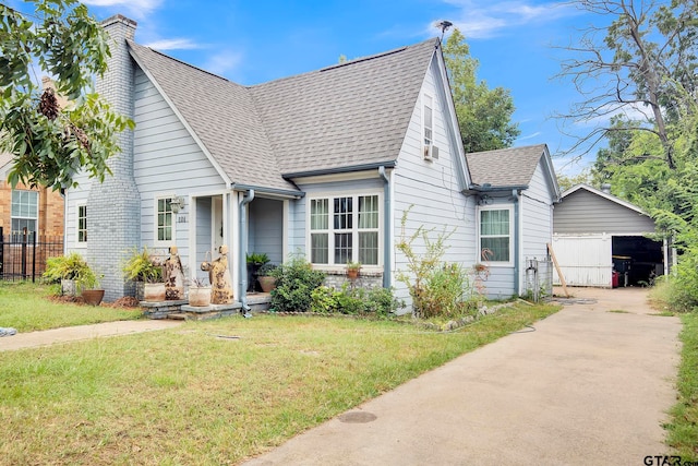 bungalow-style home with a front lawn