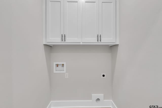 laundry room featuring hookup for an electric dryer, cabinets, and hookup for a washing machine