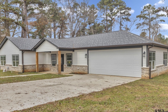 ranch-style home with a garage and a front yard