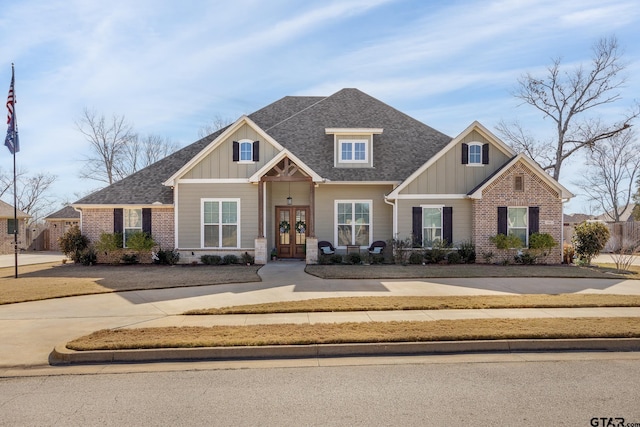 craftsman-style house with french doors