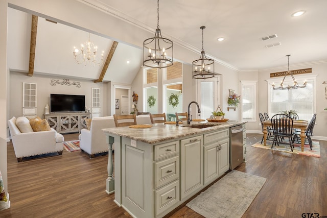 kitchen featuring light stone countertops, dishwasher, a center island with sink, a breakfast bar, and sink