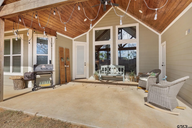 doorway to property featuring a patio area, ceiling fan, and an outdoor hangout area