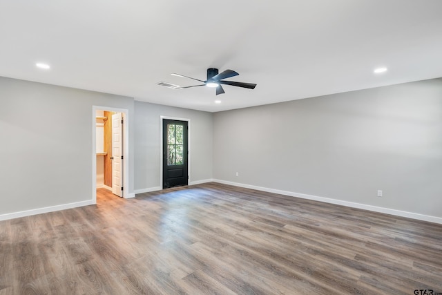 interior space featuring hardwood / wood-style floors and ceiling fan