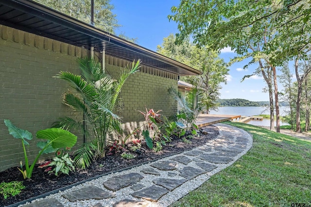 view of yard with a water view