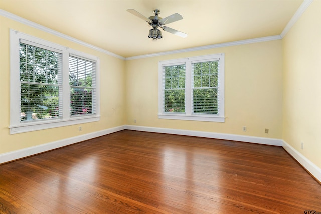 empty room with hardwood / wood-style floors, ceiling fan, plenty of natural light, and crown molding