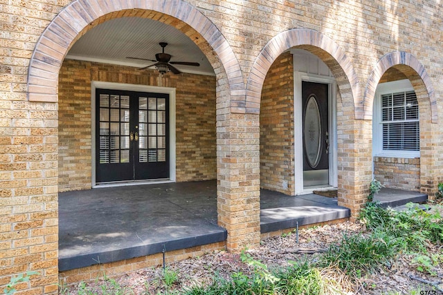 doorway to property featuring french doors and ceiling fan