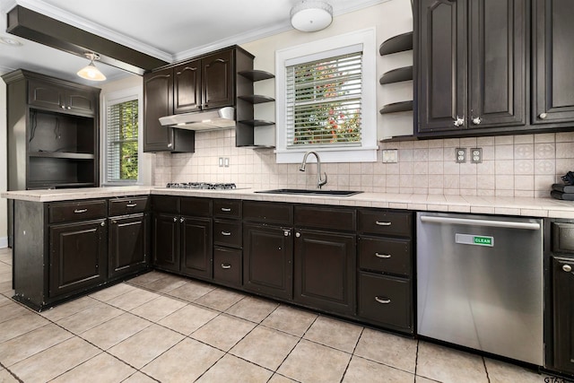 kitchen featuring tasteful backsplash, appliances with stainless steel finishes, sink, and plenty of natural light