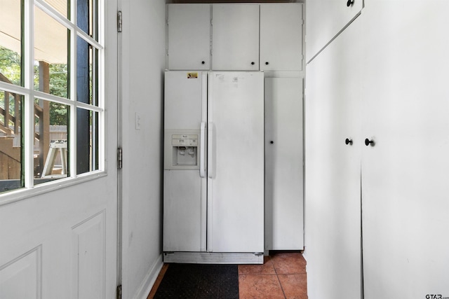 interior space featuring light tile patterned floors