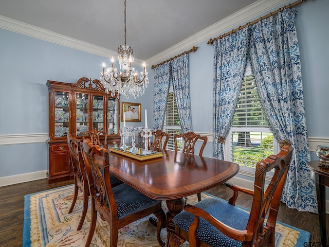 dining area with a notable chandelier, crown molding, and dark hardwood / wood-style flooring