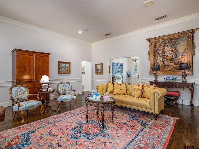 living room featuring crown molding and dark hardwood / wood-style floors