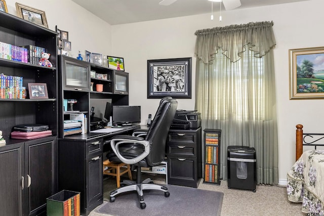 carpeted office with ceiling fan