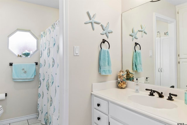 bathroom with vanity, a shower with shower curtain, and tile patterned flooring