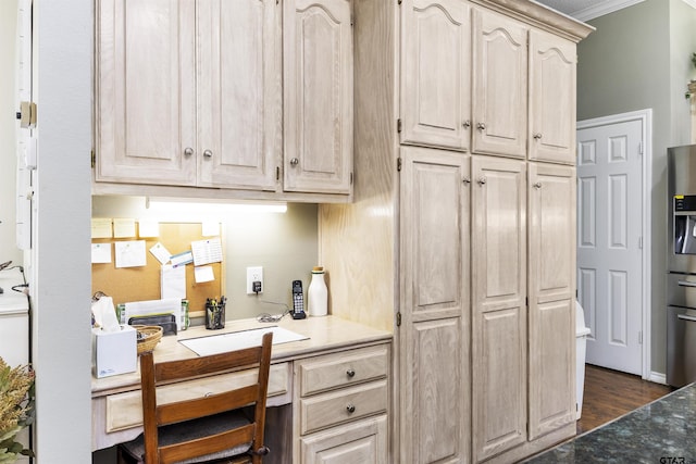 kitchen with dark hardwood / wood-style flooring, sink, crown molding, and light brown cabinets