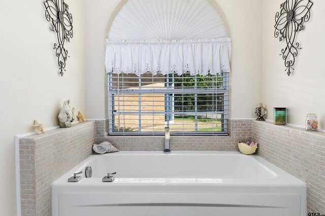 bathroom with a bathing tub