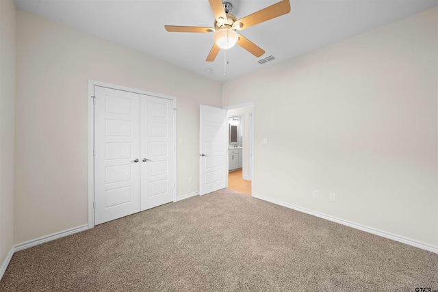 113 Hay Mdw, Winona, TX 75792 - unfurnished bedroom with carpet, a closet, baseboards, and ceiling fan