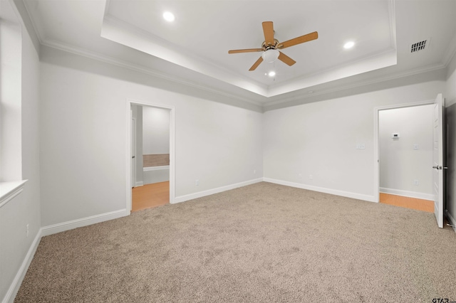 113 Hay Mdw, Winona, TX 75792 - spare room with a raised ceiling, ornamental molding, light carpet, ceiling fan, and recessed lighting