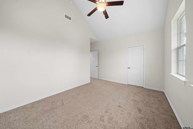 113 Hay Mdw, Winona, TX 75792 - unfurnished bedroom featuring carpet flooring, baseboards, ceiling fan, and high vaulted ceiling