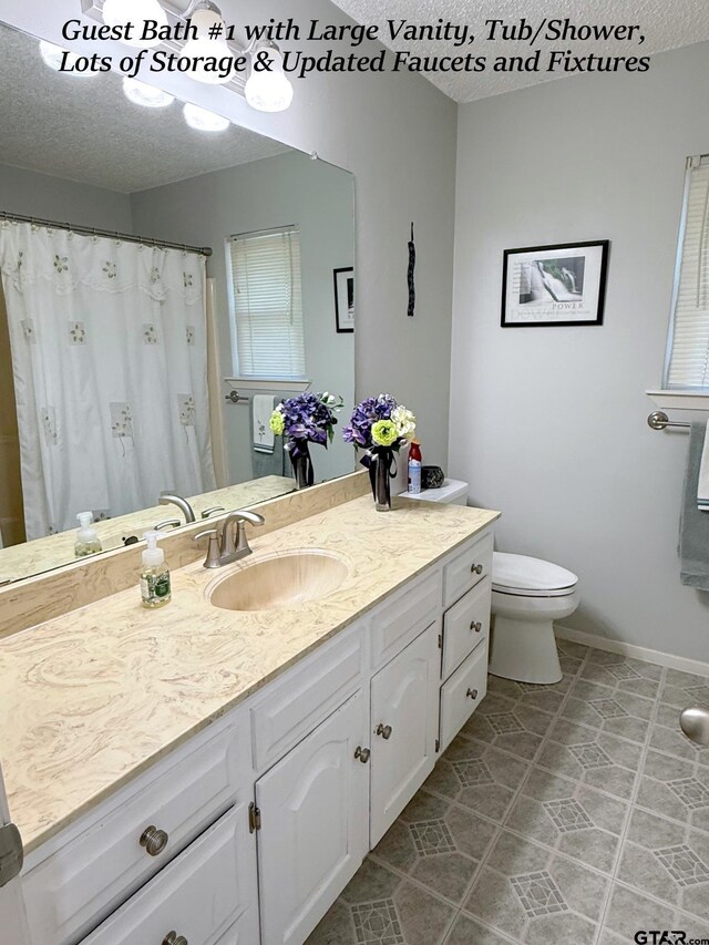 237 Oregon St, Van, TX 75790 - full bathroom featuring vanity, a textured ceiling, and tile patterned flooring