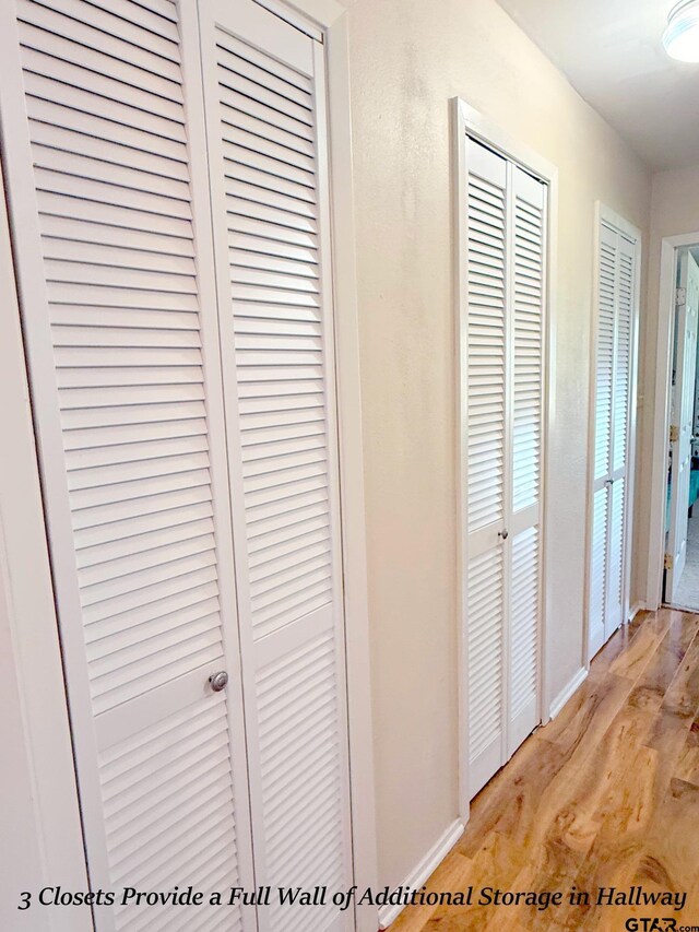 237 Oregon St, Van, TX 75790 - hallway with light wood-type flooring and baseboards