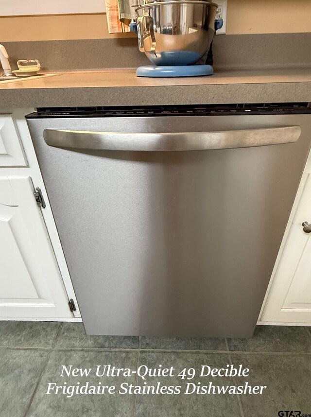 237 Oregon St, Van, TX 75790 - kitchen view of stainless steel dishwasher and white cabinetry