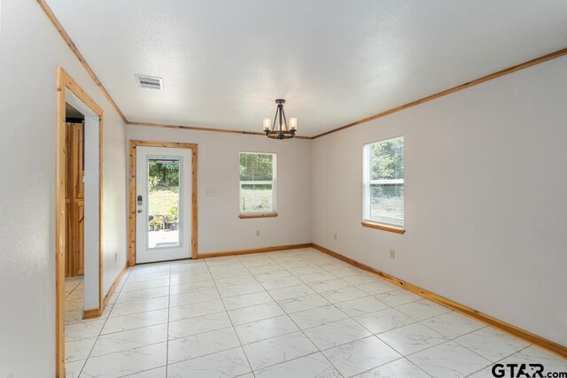 15200 W US Highway 175, Eustace, TX 75124 - unfurnished room featuring a chandelier and ornamental molding