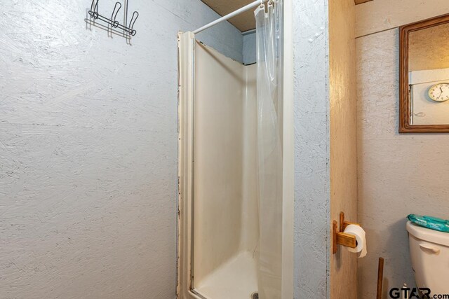 15200 W US Highway 175, Eustace, TX 75124 - full bathroom featuring a shower stall and a textured wall