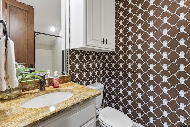 2205 Kingsmill Cir, Tyler, TX 75703 - full bathroom featuring toilet, walk in shower, and vanity