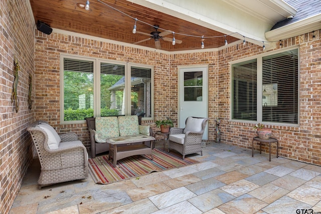 view of patio / terrace featuring ceiling fan and an outdoor living space