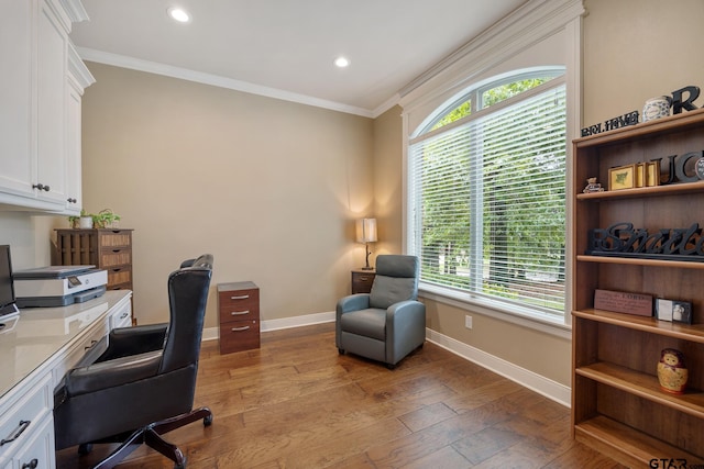 home office featuring baseboards, crown molding, wood-type flooring, and recessed lighting