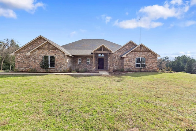 view of front of home with a front lawn