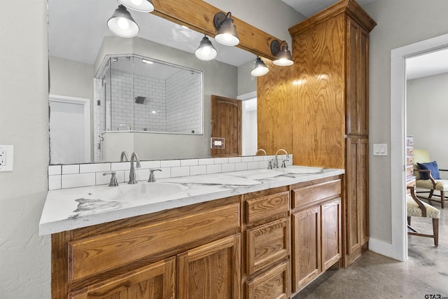 bathroom featuring vanity, an enclosed shower, and concrete floors