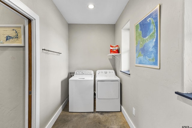 laundry room featuring washer and clothes dryer