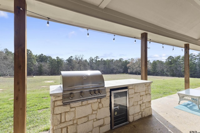 view of patio featuring grilling area and exterior kitchen