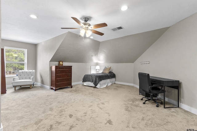 bedroom featuring light carpet, lofted ceiling, and ceiling fan