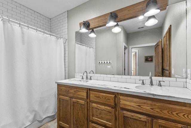 bathroom with vanity and a shower with curtain