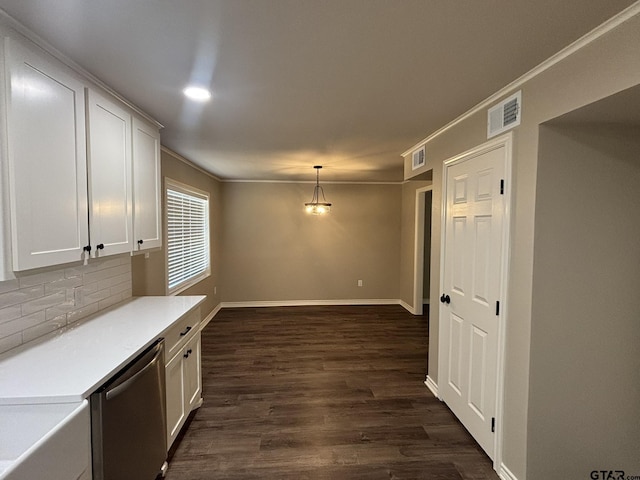 kitchen featuring dark hardwood / wood-style floors, decorative light fixtures, white cabinets, backsplash, and stainless steel dishwasher