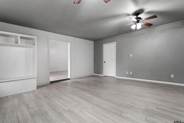 unfurnished bedroom with ceiling fan and light wood-type flooring