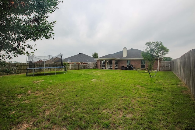 5734 Mustang Trl, Tyler, TX 75707 - view of yard with a trampoline