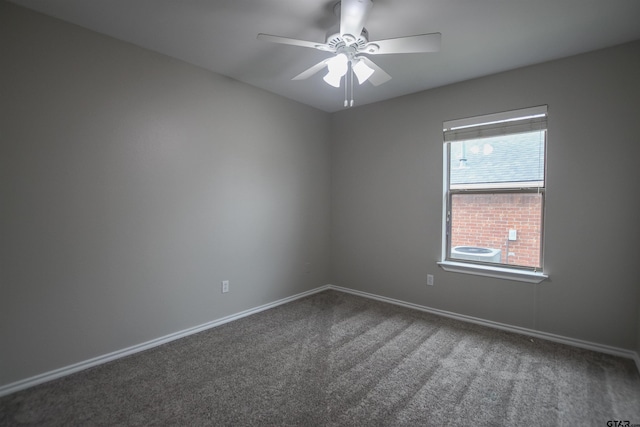 5734 Mustang Trl, Tyler, TX 75707 - spare room featuring carpet floors, baseboards, and ceiling fan