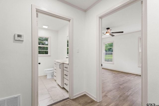 708 E Barbara St, Tyler, TX 75701 - hall featuring crown molding and healthy amount of natural light