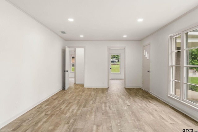 708 E Barbara St, Tyler, TX 75701 - empty room with light wood-type flooring, crown molding, and recessed lighting