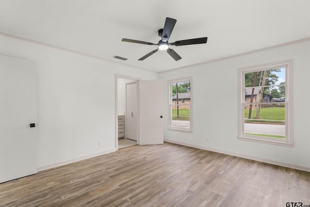 708 E Barbara St, Tyler, TX 75701 - unfurnished room featuring wood finished floors, crown molding, and a ceiling fan