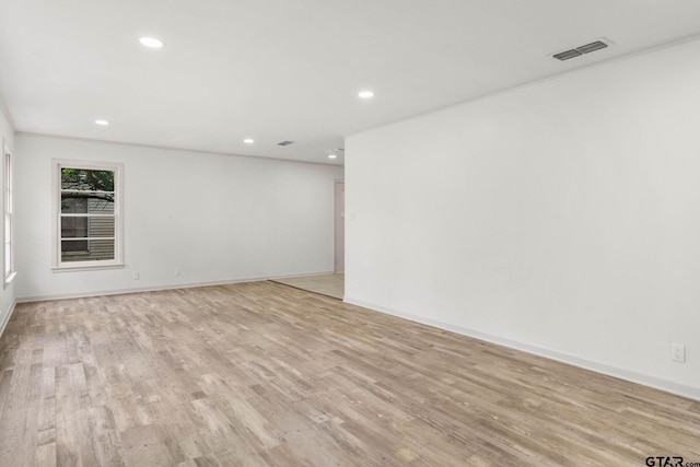 708 E Barbara St, Tyler, TX 75701 - spare room with recessed lighting and light wood finished floors