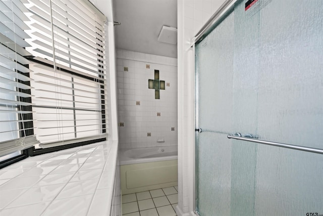 bathroom featuring independent shower and bath and tile patterned flooring