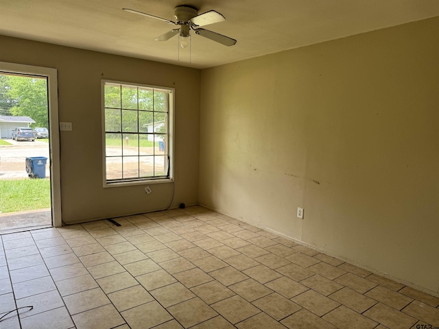 330 Randolph St, Lone Star, TX 75668 - empty room featuring ceiling fan and light tile patterned floors