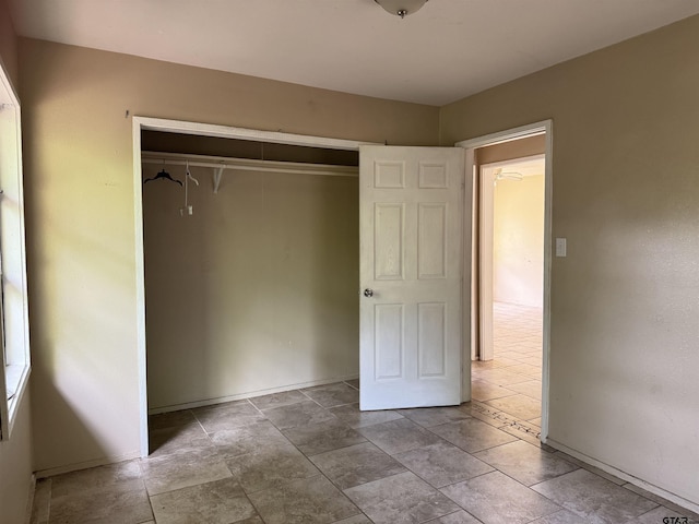 330 Randolph St, Lone Star, TX 75668 - unfurnished bedroom featuring a closet and baseboards