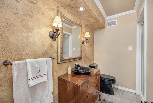 bathroom with visible vents, crown molding, baseboards, vanity, and tile patterned flooring